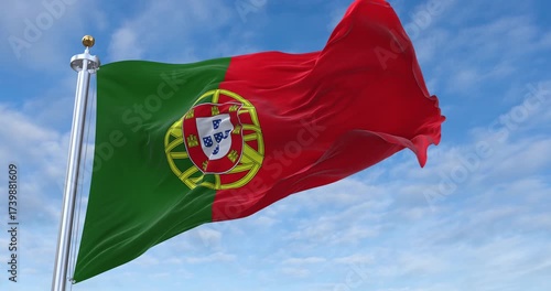 Portugal flag with flagpole waving in wind, rolling clouds background looping, 4K video (Perfect Loop)