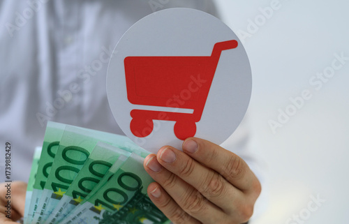 Image of hands holding euro...