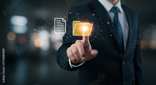 Businessman accessing digital documents with touch screen interface technology