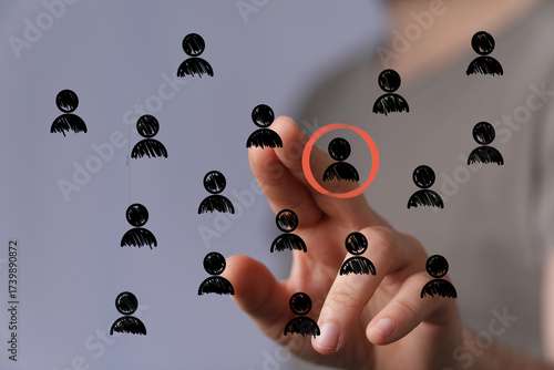 Hand selecting a single per...