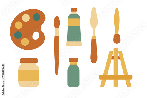 Art supplies flat lay featuring palette, paint tubes, brushes, and easel