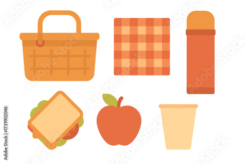 Essential items for summer picnic including basket blanket thermos sandwich and apple