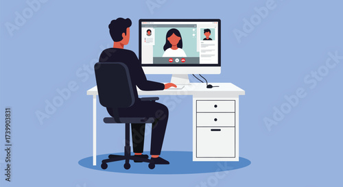 A person sits at a desk, participating in a video call on a computer with two other individuals.