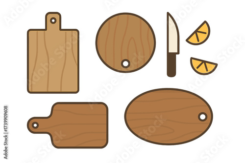 Set of various wooden cutting boards in different shapes with a kitchen knife and citrus fruit slices