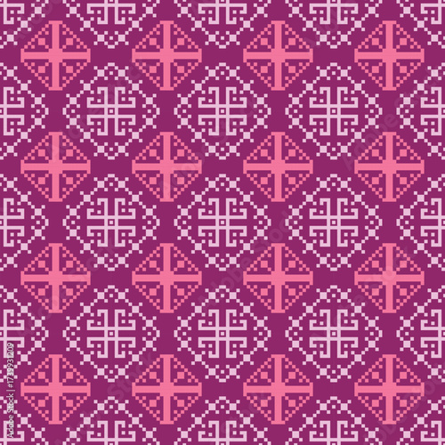 Pixel art textile pattern in pink and magenta, featuring circular geometric motifs with maze-like details, arranged symmetrically on a deep background.