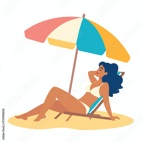 A woman relaxes in a beach chair under a colorful umbrella on a sunny day.