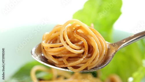 Italian spaghetti with delicious shrimp and squid, spaghetti in a white plate.