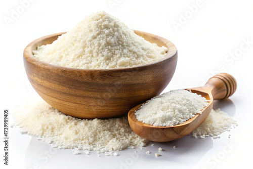 Grated Parmesan Cheese: A close-up shot showcases a generous pile of finely grated parmesan cheese nestled in a rustic wooden bowl, accompanied by a wooden scoop, highlighting its texture and flavor.