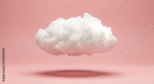 A solitary fluffy white cotton cloud floating in mid-air against a vibrant pink studio background creating a surreal and dreamy atmosphere