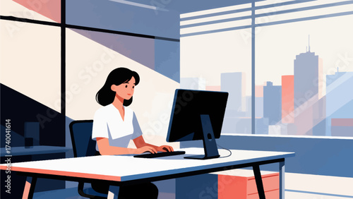 Woman working at computer in office