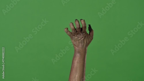 A creepy zombie hand is frightening