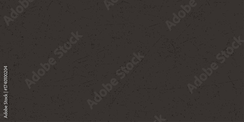 A dark, black paper and leather texture creates a seamless surface pattern for a rough material backdrop
