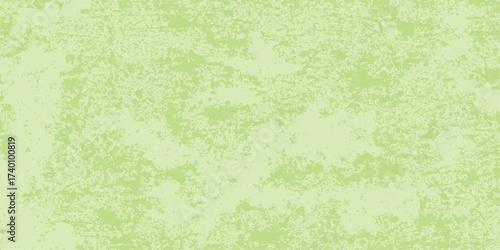 A light green grunge background with a dirty and aged paper texture for a vintage parchment design