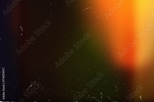 Light overlay, orange warm color. Blurry spots. Old film light leak texture with scratches, grain, noise and dust. Perfect as background or overlay for photo editing, video design, and digital art.