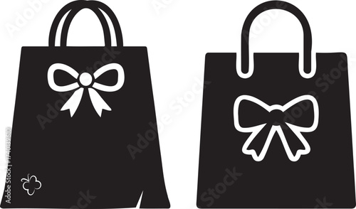 Two black shopping bags with bows, one with a small butterfly symbol, suggesting shopping, gifts, or perhaps a pharmacy or boutique, isolated on transparent background