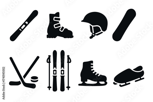 Winter sports icon set. Vector black symbols of ski, snowboard, helmet, skate, and hockey glyph illustrations