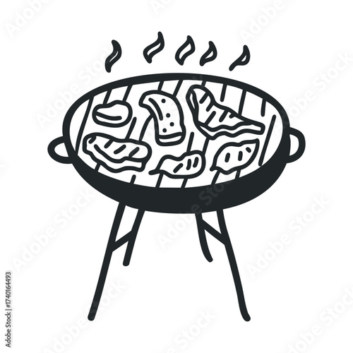 Grill with various meats steaming on barbecue