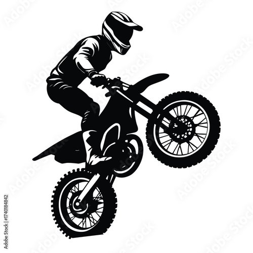 Motocross rider on dirt bike silhouette action