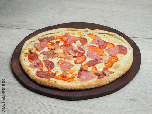 A full pizza against a light background, at a 45-degree angle.