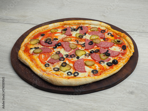 A full pizza against a light background, at a 45-degree angle.