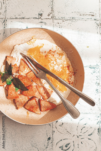 Breakfast, fried eggs with sausage, in a frying pan, sunlight, no people,