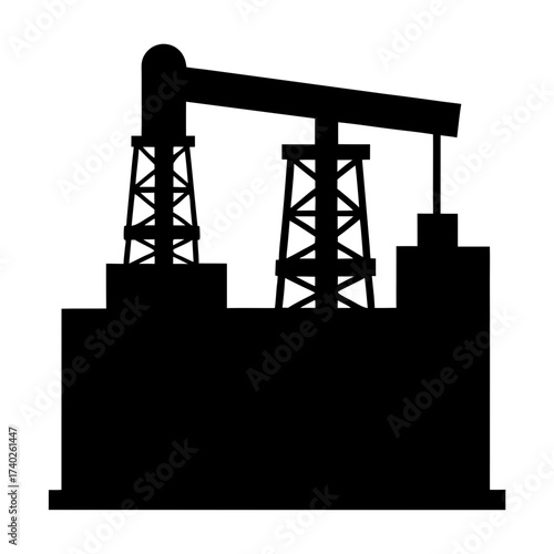 Silhouette of industrial oil well with tower, machinery, and building below