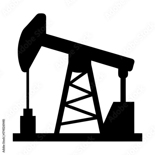 Silhouette of an oil pumpjack extracting petroleum from the earth