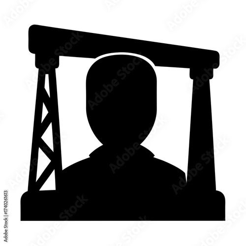 Silhouette of a faceless person in front of an oil drilling rig