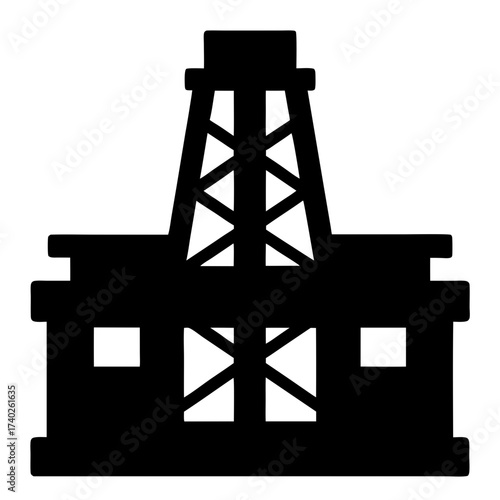 Silhouette of an industrial oil derrick structure and support building