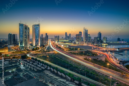  Beautiful city view of Seef district at sunset, Bahrain.