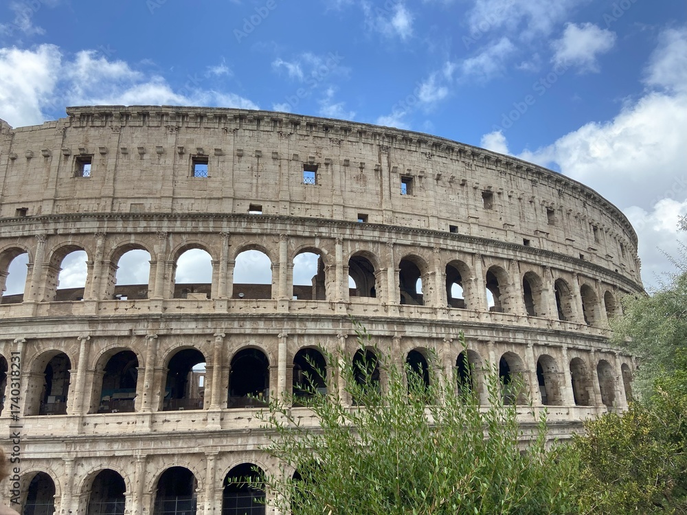 Fototapeta premium The iconic Colosseum in Rome, Italy, captured in stunning detail. The image showcases the grandeur and historical architecture of this ancient amphitheater, perfect for illustrating travel, history, a