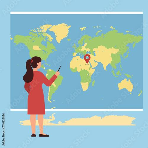 Woman points to location on world map, highlighting travel or education