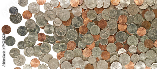 A large display of pennies, nickels, dimes and quarters in circulation on a transparent background..