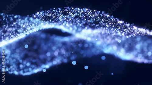 Abstract Digital Animation Of Wavy Blue Particles Flowing Against Dark Background