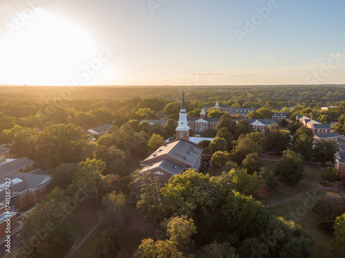 Sunset Drone Images and 4K Video of Downtown Wake Forest North Carolina, Including the Historic District and The Southeastern Baptist Seminary.