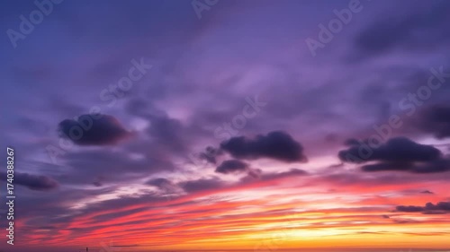 flying shot above sky on the sunrise with purple orange clouds dramatic sky at sunset