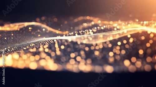 Abstract Golden Particle Wave Against Dark Background with Bokeh Effect and Dynamic Flowing Motion
