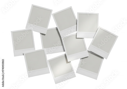 White instant photo frames scattered isolated on a transparent background