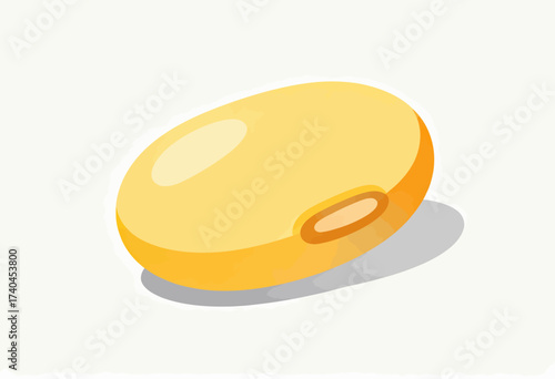A yellow bean is shown on a white background. The bean is round and has a slightly flattened appearance