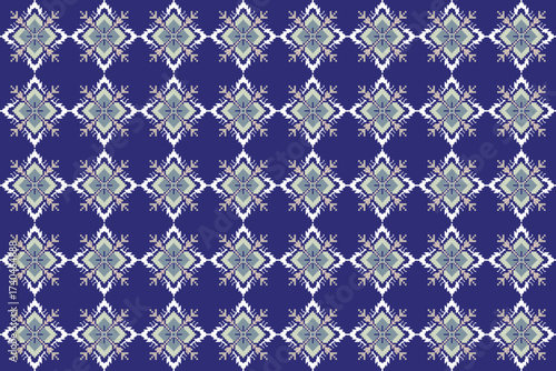 This fabric features a repeating floral diamond motif in gray and white, set against a deep blue background, creating a bold and symmetrical decorative pattern.