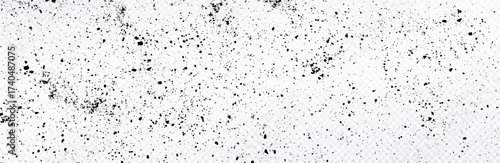 Black grunge texture with scattered speckles and splatters isolated on transparent background. Abstract gritty surface design featuring chaotic dust, charcoal, and ink effects.