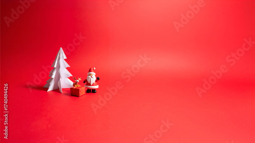 A Minimalist Christmas Greeting Card Concept with Santa, Reindeer, and Gifts Framed by an Elegant Origami Tree on a Bold Festive Red Canvas