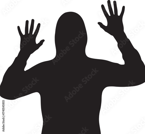 Silhouette of a person surrendering arms raised