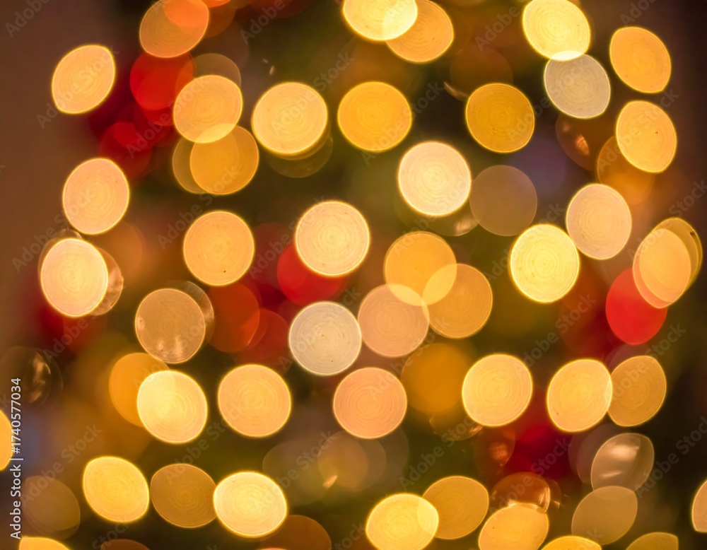 Obraz premium Blurred image of colorful, circular lights, creating a festive, warm glow