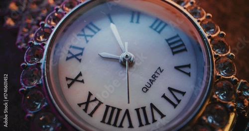 Wallpaper Mural Close Up of Decorative Clock with Roman Numerals with Ornate Jeweled Frame Showing Precise Time. Stylish Design Symbolizing Elegance, Luxury, Punctuality, Tradition. Symbolic Concept of Measuring Time Torontodigital.ca