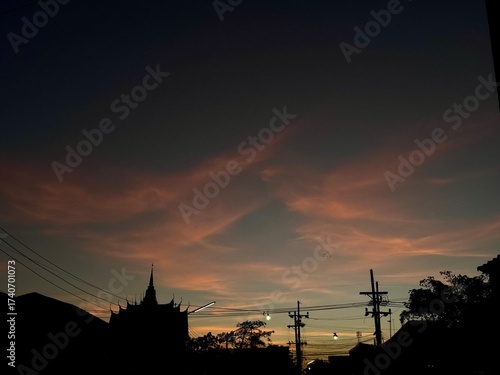 A serene evening atmosphere before sunset in Pak Phanang, Nakhon Si Thammarat, Thailand, captured on October 7, 2025, around 6 PM.