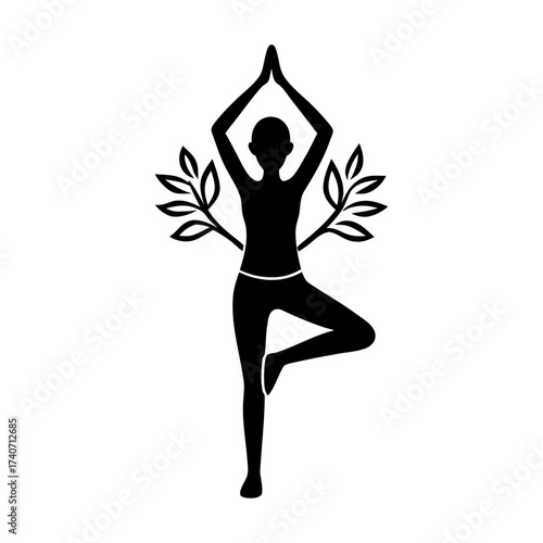 Silhouette of a woman in tree pose with branches behind her in black and white