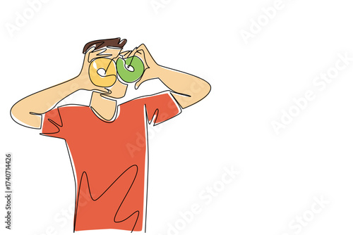 Continuous one line drawing a young man holds 2 donuts with both hands like looking through telescopes. Eyeing another favorite food. National No Diet Day. Single line draw design vector illustration