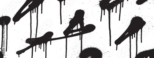 Black spray paint drips creating a grunge texture ideal for backgrounds and urban designs
