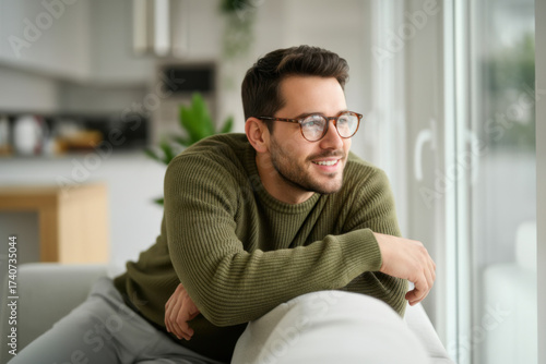 Man wearing a green sweater